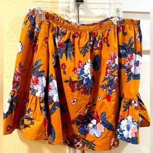 Off the shoulder blouse with bell sleeves. Perfect for fall